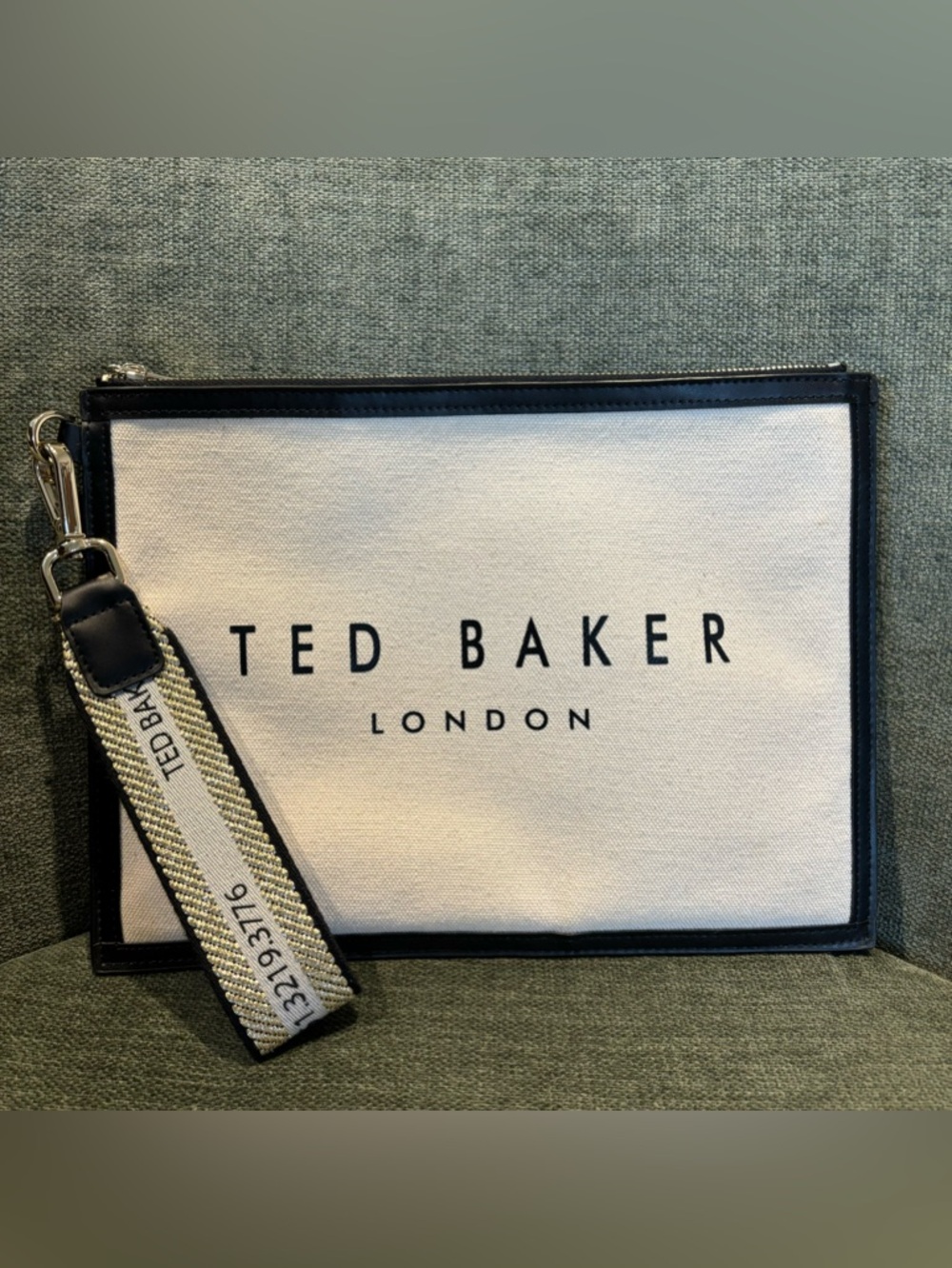 Ted Baker London Cream Canvas Wristlet with Black Trim